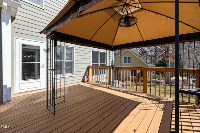 wooden deck featuring a gazebo