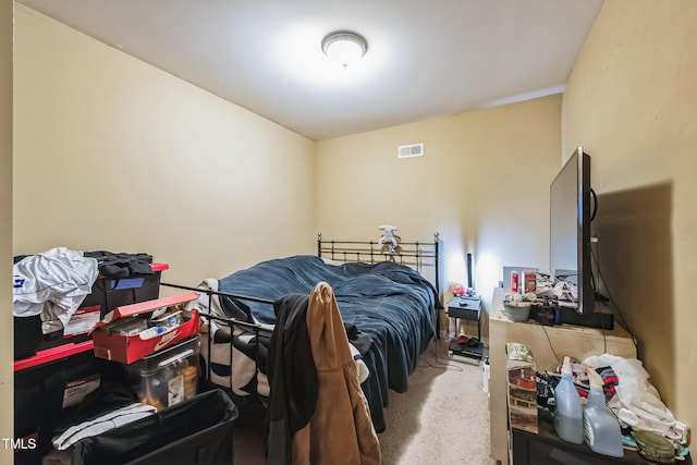 bedroom featuring visible vents and carpet