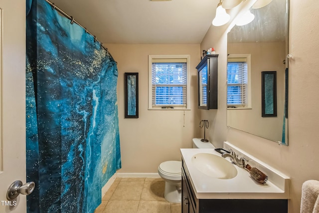 full bath with vanity, a shower with curtain, baseboards, tile patterned flooring, and toilet