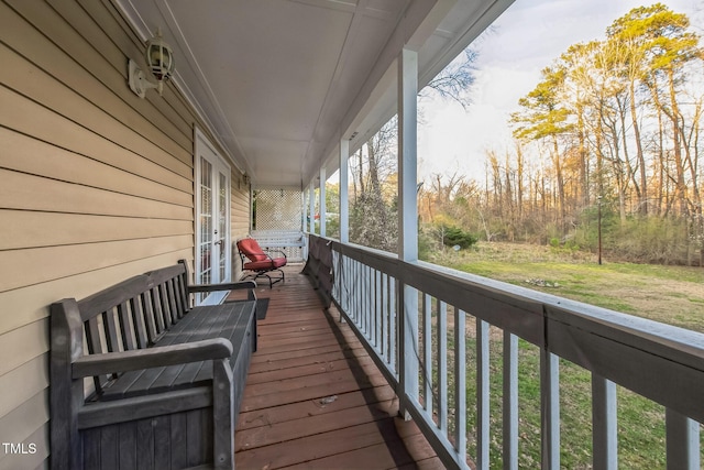 balcony featuring french doors