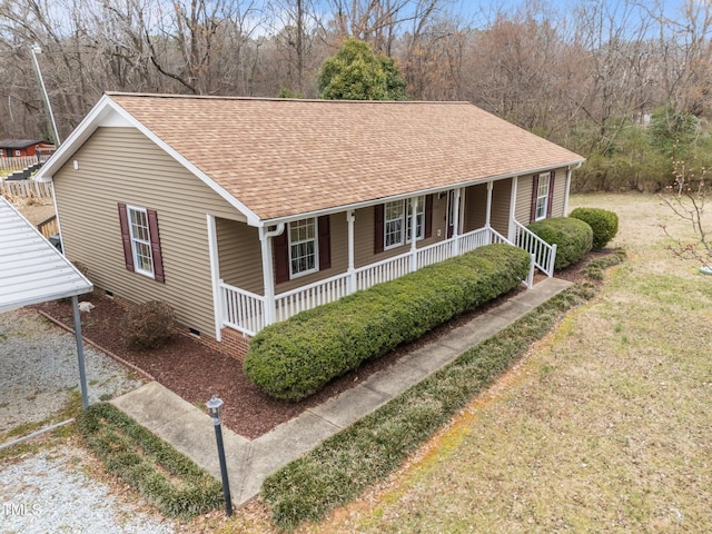 view of front facade with a porch, crawl space, and a shingled roof