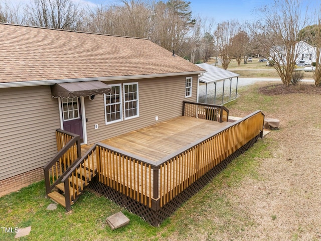 deck featuring a yard