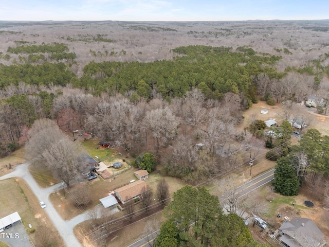 bird's eye view with a forest view