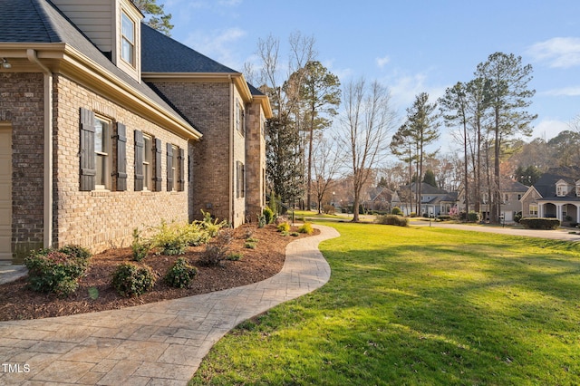 view of yard with a residential view