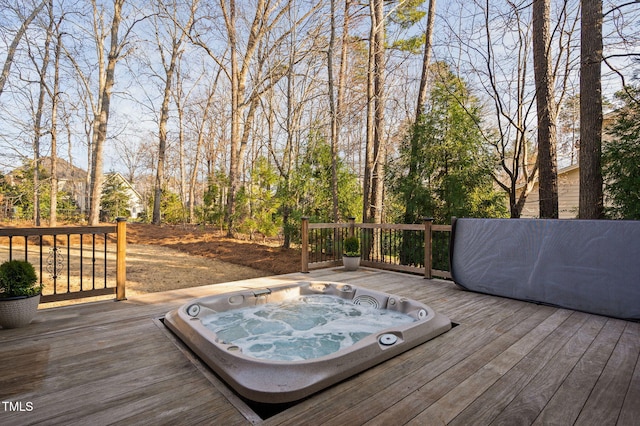 wooden deck with hot tub deck surround