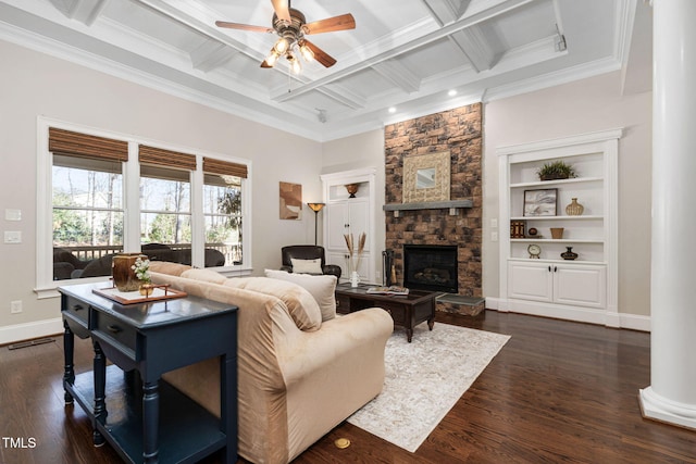 living area with a fireplace, a ceiling fan, dark wood finished floors, and coffered ceiling