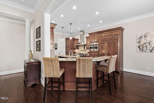 kitchen with dark wood-style floors, a peninsula, oven, a kitchen breakfast bar, and wall chimney range hood