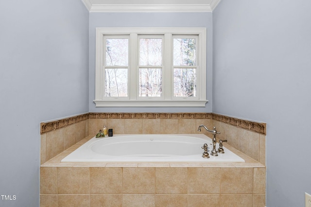 bathroom featuring a wealth of natural light, a garden tub, and ornamental molding