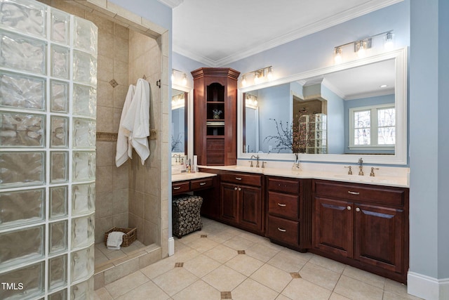 full bath with crown molding, a walk in shower, double vanity, and a sink