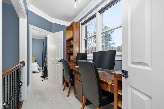 office area with light carpet and ornamental molding