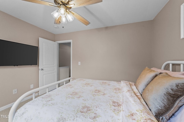 bedroom featuring carpet flooring, a ceiling fan, and baseboards