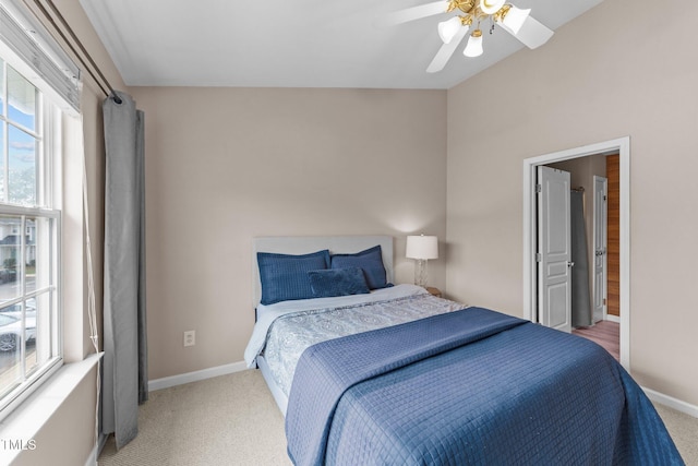 bedroom with carpet flooring, a ceiling fan, and baseboards