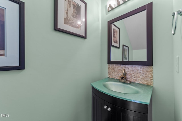 bathroom featuring backsplash and vanity