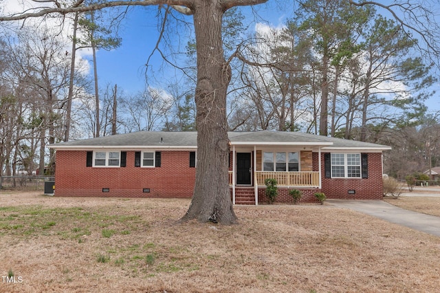 205 Woodside Dr, Goldsboro, NC 27534 - single story home with brick siding, a shingled roof, a porch, crawl space, and driveway