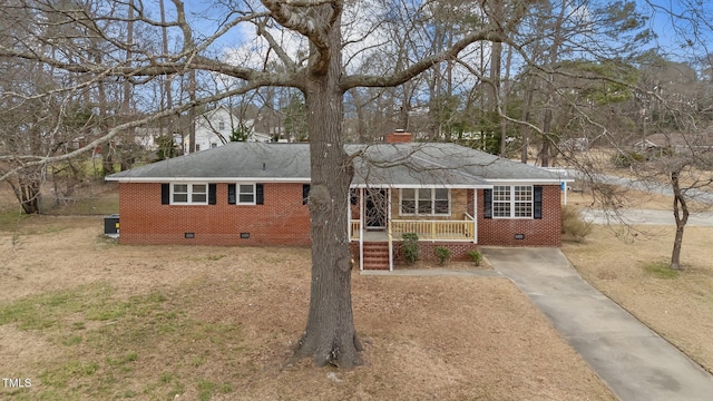 205 Woodside Dr, Goldsboro, NC 27534 - ranch-style house featuring crawl space, a porch, a chimney, and brick siding