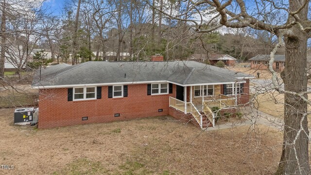205 Woodside Dr, Goldsboro, NC 27534 - back of house with a shingled roof, brick siding, a chimney, and crawl space