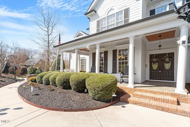 property entrance with a porch