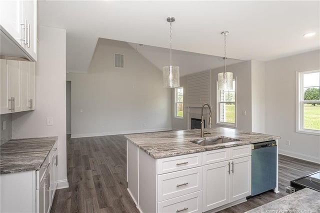 5815 James Allen Ln, Stedman, NC 28391 - kitchen with a sink, dishwashing machine, dark wood-style floors, white cabinetry, and lofted ceiling