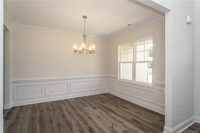 5815 James Allen Ln, Stedman, NC 28391 - unfurnished room with a chandelier, crown molding, dark wood finished floors, and wainscoting
