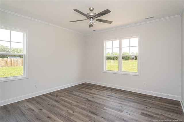 5815 James Allen Ln, Stedman, NC 28391 - empty room with plenty of natural light, crown molding, wood finished floors, baseboards, and ceiling fan
