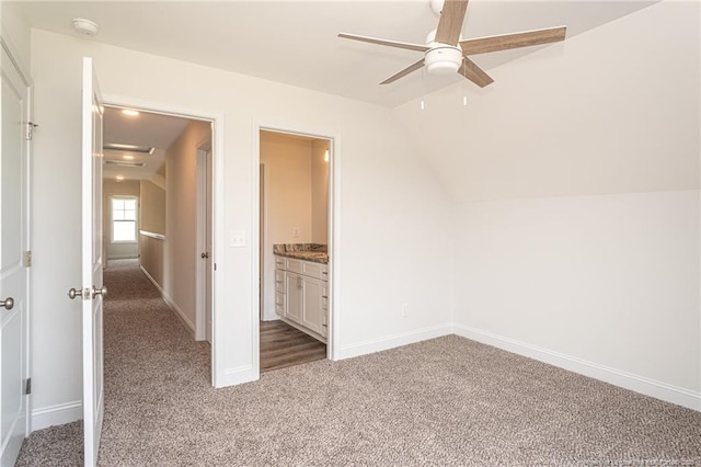 5815 James Allen Ln, Stedman, NC 28391 - unfurnished bedroom featuring carpet flooring, lofted ceiling, baseboards, and ensuite bathroom