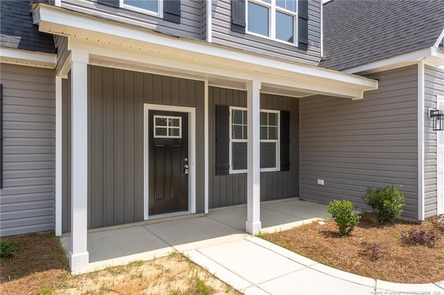 5815 James Allen Ln, Stedman, NC 28391 - property entrance featuring roof with shingles and a porch