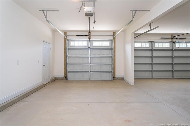 5815 James Allen Ln, Stedman, NC 28391 - garage with a garage door opener and baseboards