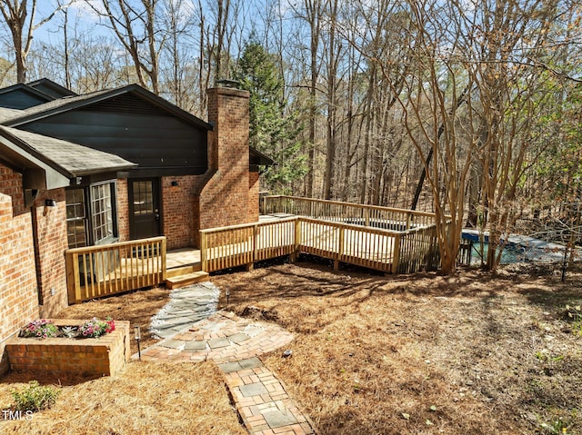 view of yard featuring a deck