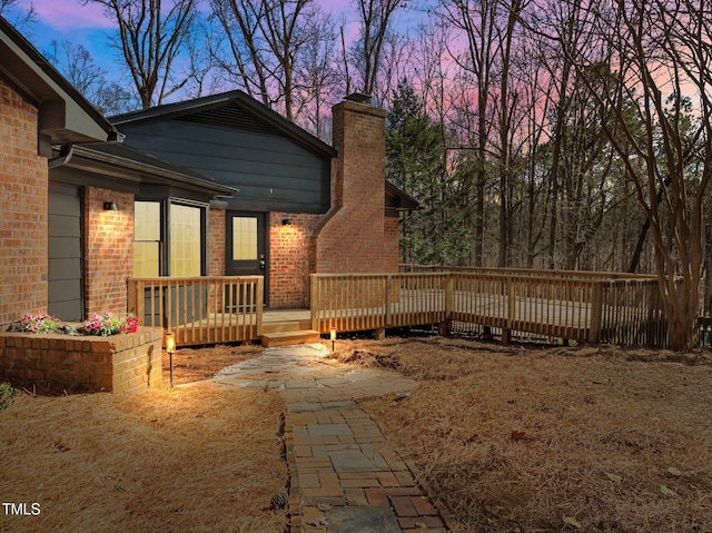 view of yard featuring a wooden deck