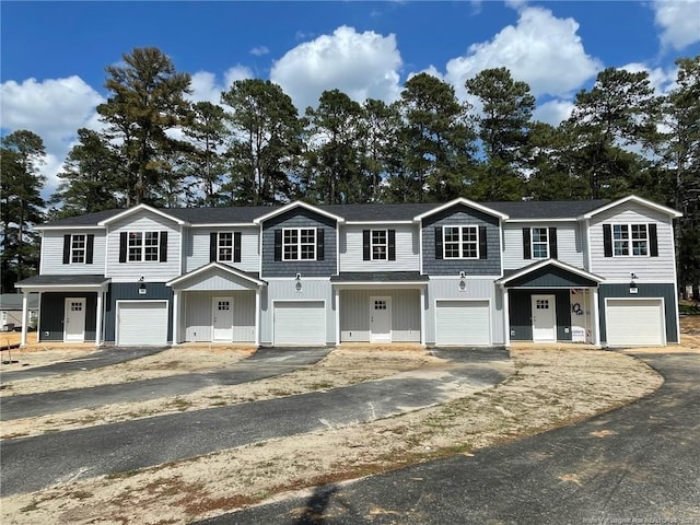 multi unit property featuring driveway