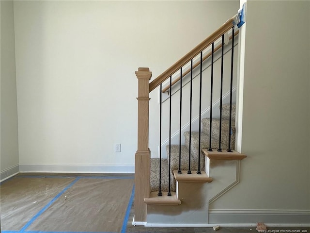 staircase with baseboards