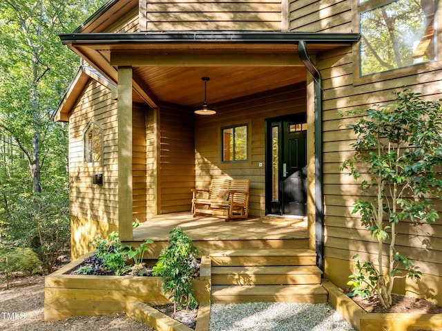 entrance to property with a porch