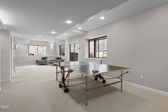 game room featuring recessed lighting, baseboards, and light colored carpet