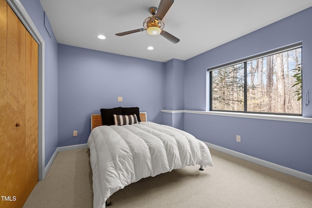 bedroom with recessed lighting, baseboards, and carpet floors