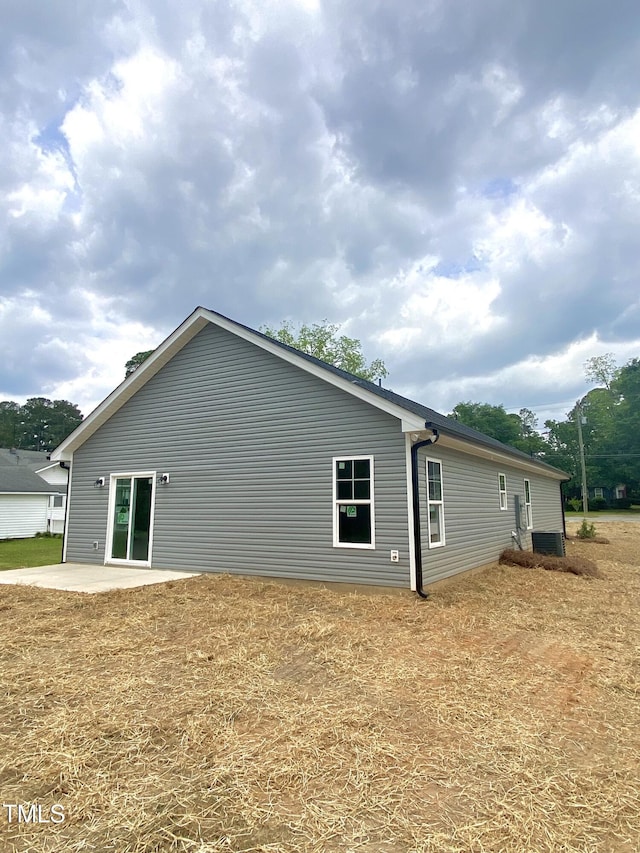 306 E Roseboro St, Roseboro, NC 28382 - view of side of property with a patio area and cooling unit