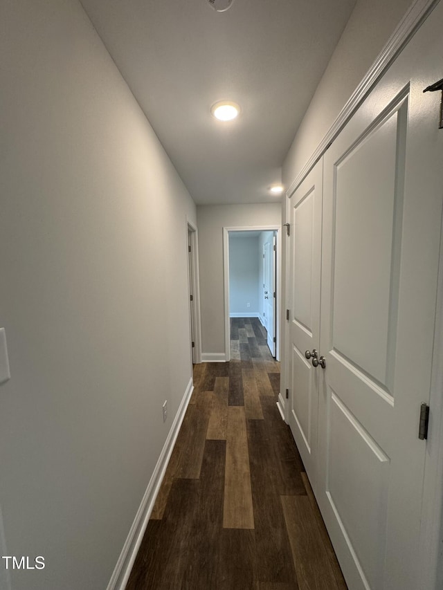 306 E Roseboro St, Roseboro, NC 28382 - hall featuring dark wood-style floors and baseboards