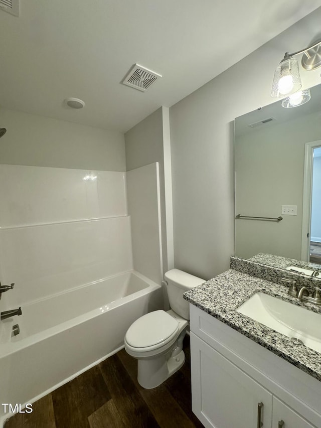 306 E Roseboro St, Roseboro, NC 28382 - full bathroom with wood finished floors, toilet, shower / bathtub combination, and vanity