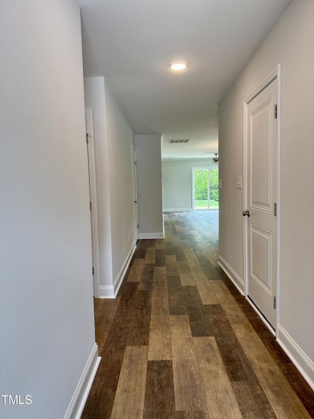 306 E Roseboro St, Roseboro, NC 28382 - hallway featuring baseboards and wood finished floors