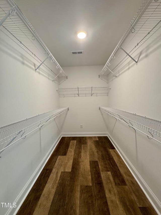 306 E Roseboro St, Roseboro, NC 28382 - walk in closet featuring wood finished floors