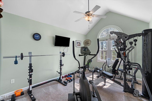 exercise room featuring baseboards, a ceiling fan, and vaulted ceiling