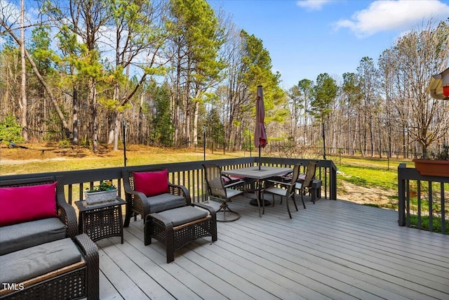 deck with outdoor dining space