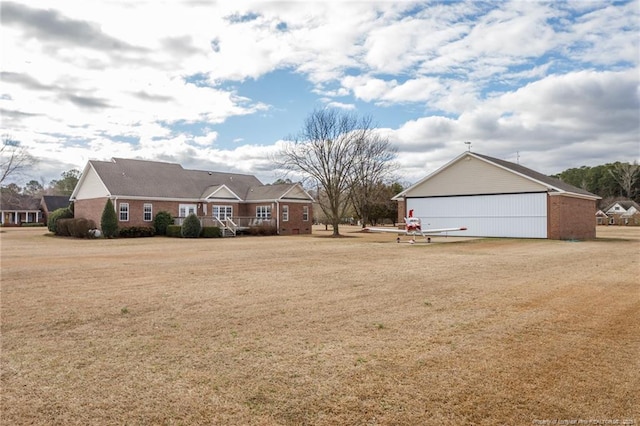 view of yard with a garage