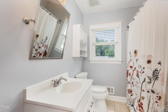 full bath featuring vanity, tile patterned floors, toilet, and visible vents