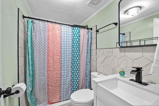 full bathroom with visible vents, curtained shower, crown molding, toilet, and tile walls