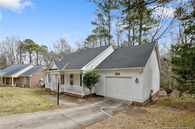 view of front of house with a front yard, driveway, roof with shingles, covered porch, and a garage