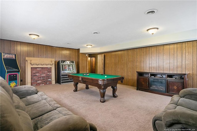 game room with pool table, wooden walls, visible vents, and light carpet