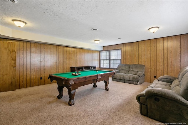 rec room featuring visible vents, wood walls, carpet floors, a textured ceiling, and billiards