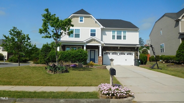 craftsman-style home featuring a front yard, an attached garage, stone siding, and concrete driveway