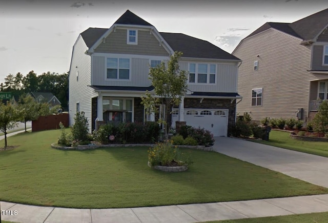 craftsman house featuring stone siding, driveway, an attached garage, and a front lawn