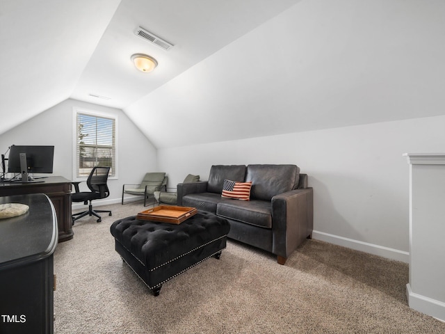 home office featuring visible vents, baseboards, carpet, and vaulted ceiling